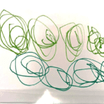 Green scribbles drawn with a marker