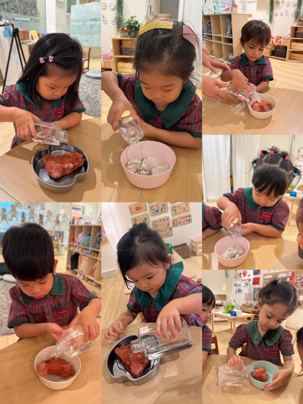 Nursery 1 children observing how water changes clay