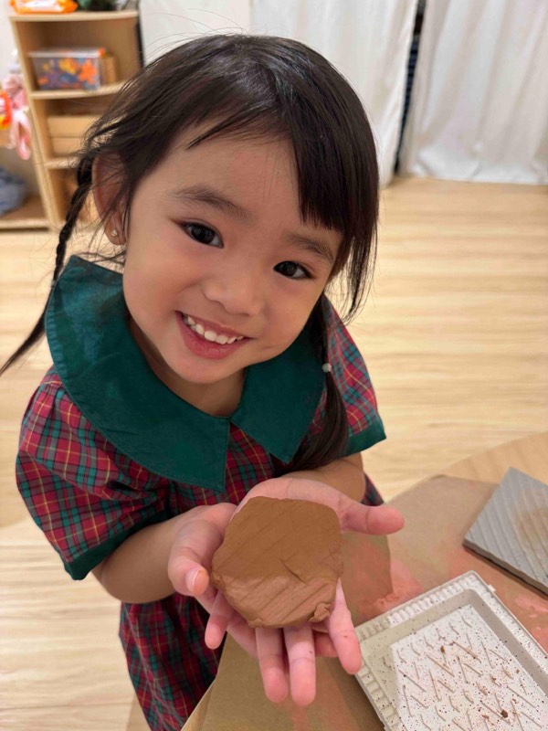 Nursery 1 children discovering textures and patterns with clay