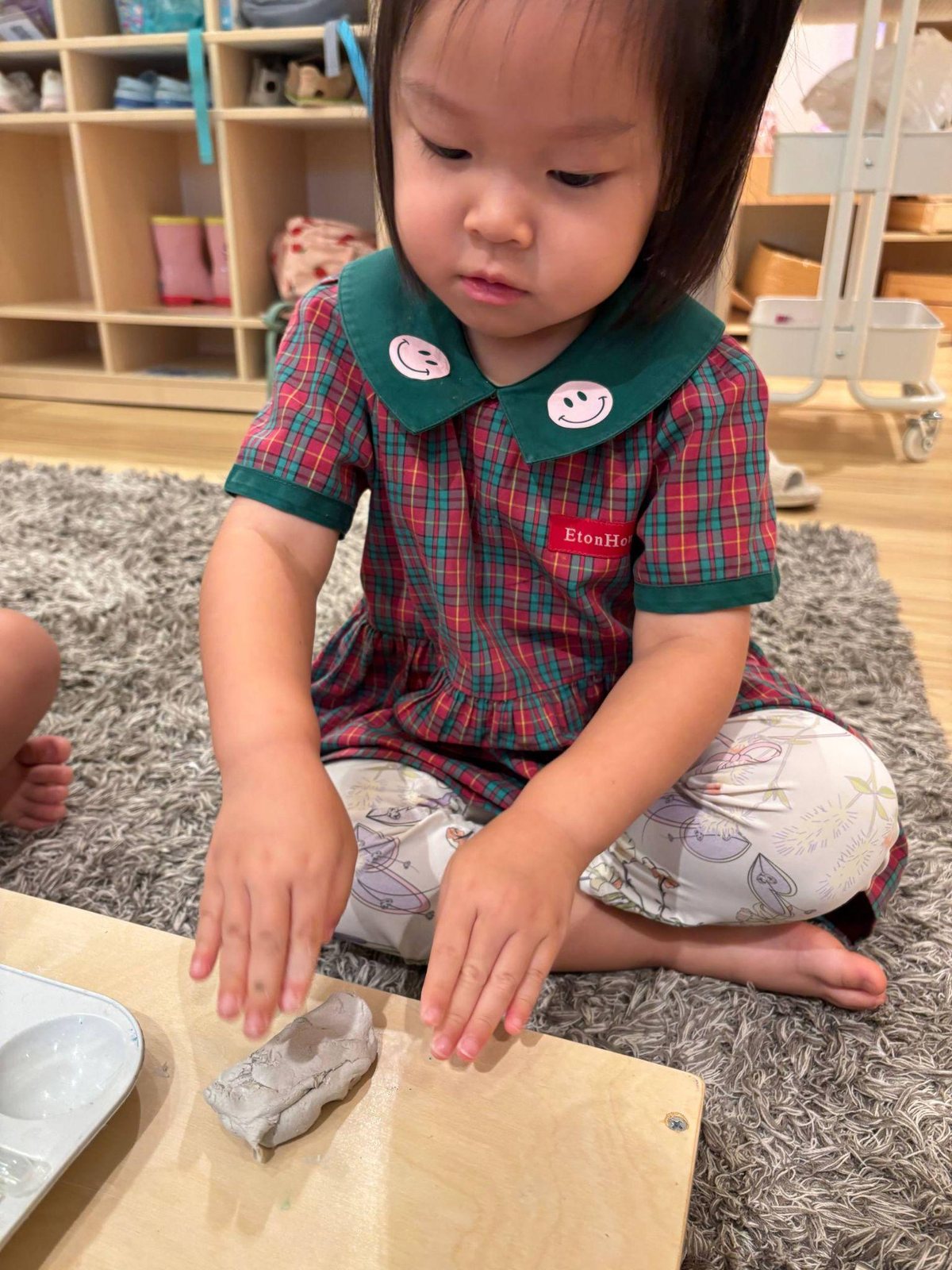 Nursery 1 children creating coloured clay