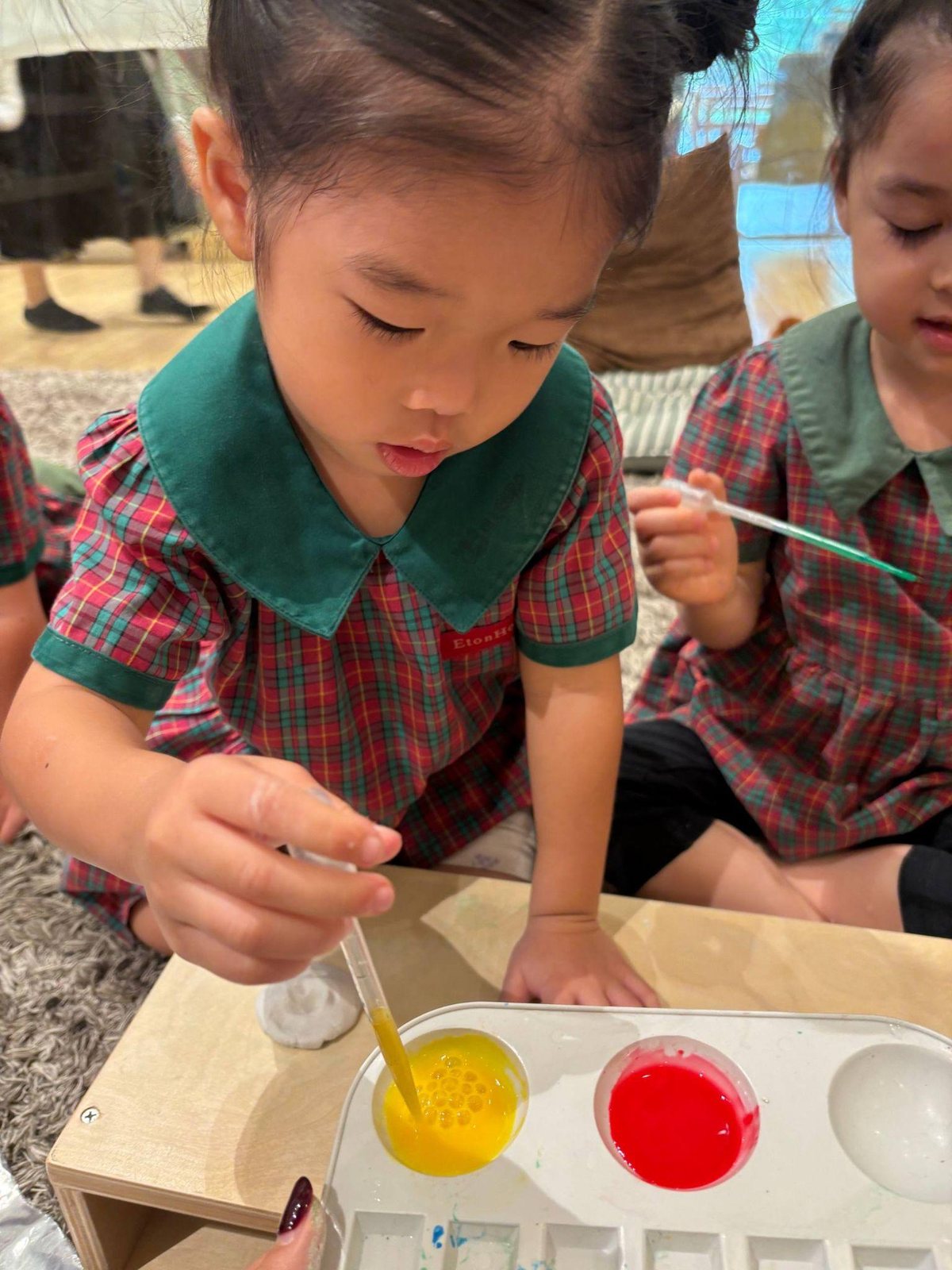 Nursery 1 children creating coloured clay
