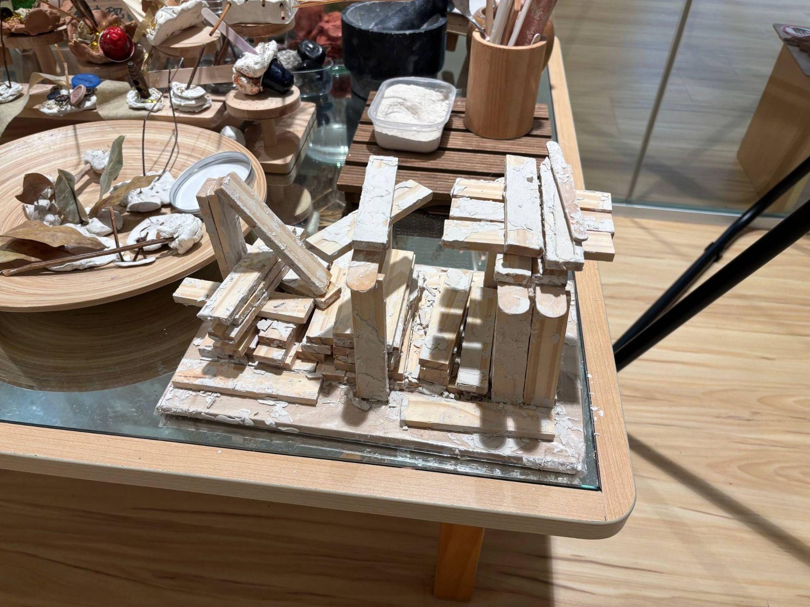 A structure created with clay slip and wooden planks
