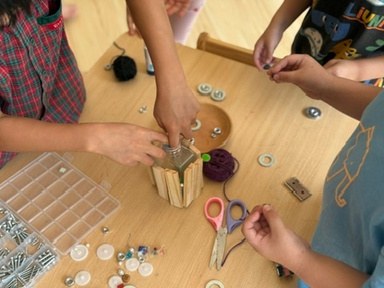 Children examining how different materials can be connected